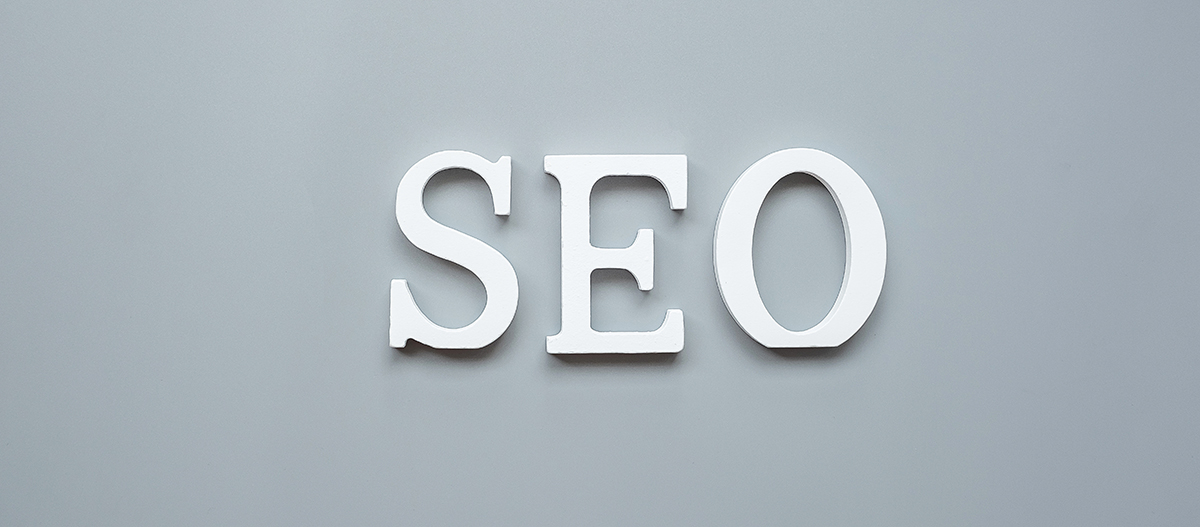 SEO (Search Engine Optimization) in white letter on gray background